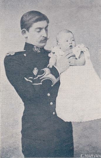 Ferdinand at the rank of Major with Prince Charles in his arms