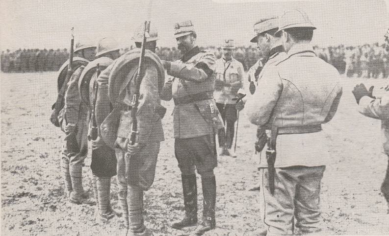 King Ferdinand decorating the meritous soliders at Racaciuni on 17 Ianuary 1917