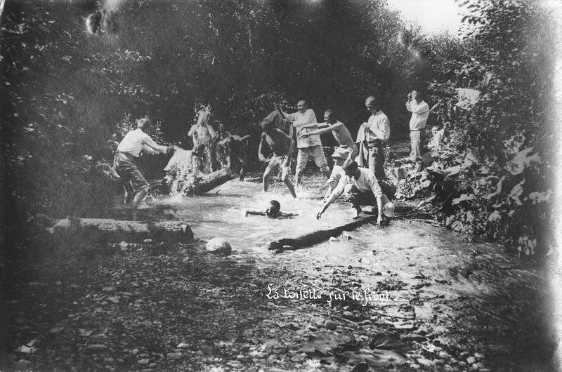 The toilet on the front, soldiers bathing in a river